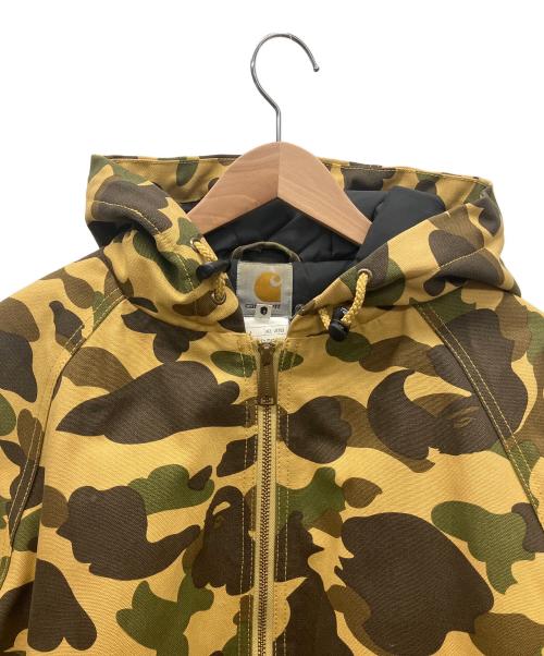 A BATHING APE（ア ベイシング エイプ）A BATHING APE (ア ベイシング エイプ) CarHartt (カーハート) アクティブジャケット ブラウン サイズ:Mの古着・服飾アイテム
