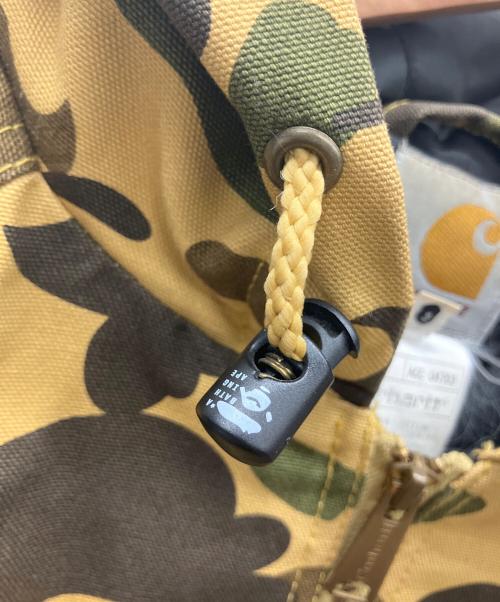 A BATHING APE（ア ベイシング エイプ）A BATHING APE (ア ベイシング エイプ) CarHartt (カーハート) アクティブジャケット ブラウン サイズ:Mの古着・服飾アイテム