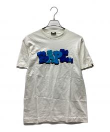 A BATHING APE×KAWS（ア ベイシング エイプ×カウズ）の古着「半袖カットソー」｜ブルー×ホワイト