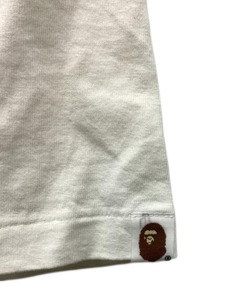 A BATHING APE（ア ベイシング エイプ）A BATHING APE (ア ベイシング エイプ) KAWS (カウズ) 半袖カットソー ブルー×ホワイト サイズ:Mの古着・服飾アイテム