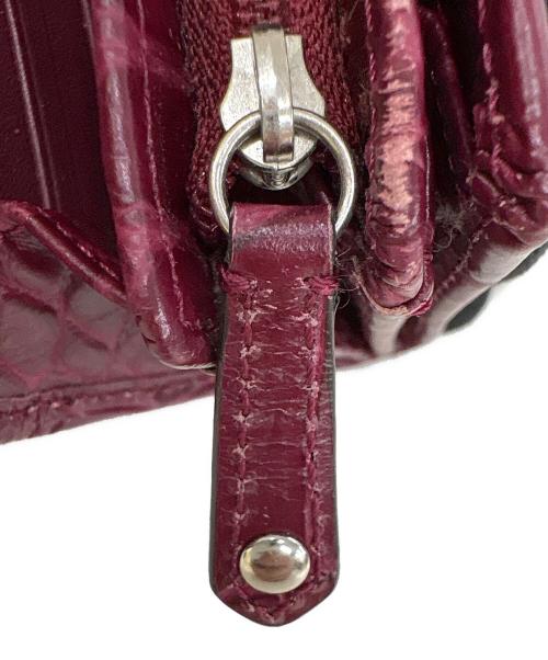 COACH（コーチ）COACH (コーチ) 2つ折り財布 ワインレッドの古着・服飾アイテム