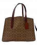 COACHコーチ）の古着「チャーリー キャリオール シグネチャートートバッグ」