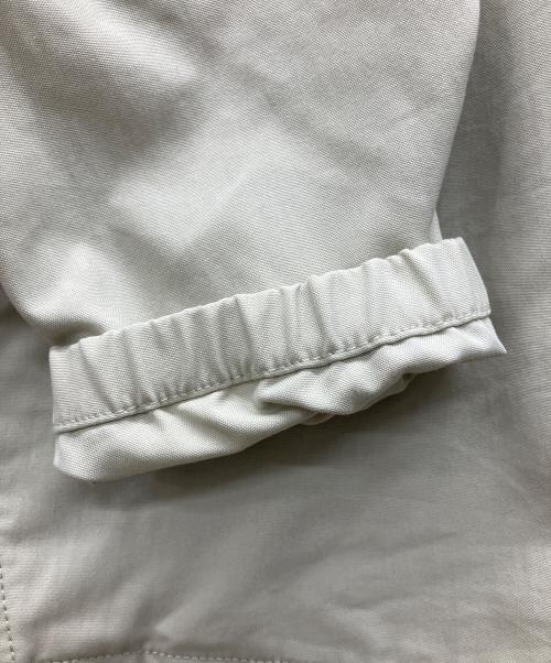 Patagonia（パタゴニア）Patagonia (パタゴニア) プルオーバーパーカー ベージュ×ネイビー サイズ:Lの古着・服飾アイテム