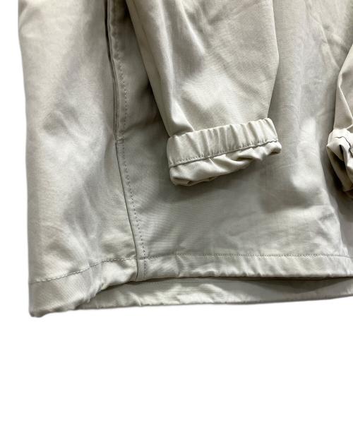 Patagonia（パタゴニア）Patagonia (パタゴニア) プルオーバーパーカー ベージュ×ネイビー サイズ:Lの古着・服飾アイテム