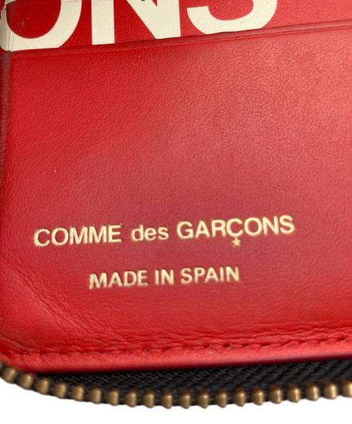 COMME des GARCONS（コムデギャルソン）COMME des GARCONS (コムデギャルソン) ラウンドファスナー財布 レッドの古着・服飾アイテム