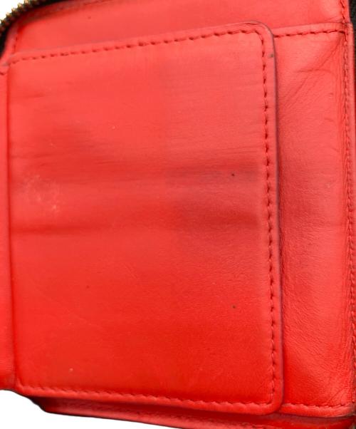 COMME des GARCONS（コムデギャルソン）COMME des GARCONS (コムデギャルソン) ラウンドファスナー財布 レッドの古着・服飾アイテム