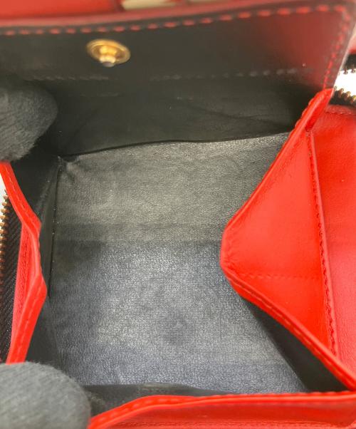 COMME des GARCONS（コムデギャルソン）COMME des GARCONS (コムデギャルソン) ラウンドファスナー財布 レッドの古着・服飾アイテム