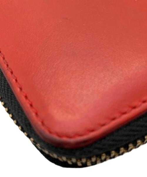COMME des GARCONS（コムデギャルソン）COMME des GARCONS (コムデギャルソン) ラウンドファスナー財布 レッドの古着・服飾アイテム