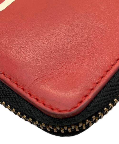 COMME des GARCONS（コムデギャルソン）COMME des GARCONS (コムデギャルソン) ラウンドファスナー財布 レッドの古着・服飾アイテム