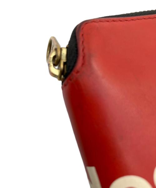 COMME des GARCONS（コムデギャルソン）COMME des GARCONS (コムデギャルソン) ラウンドファスナー財布 レッドの古着・服飾アイテム