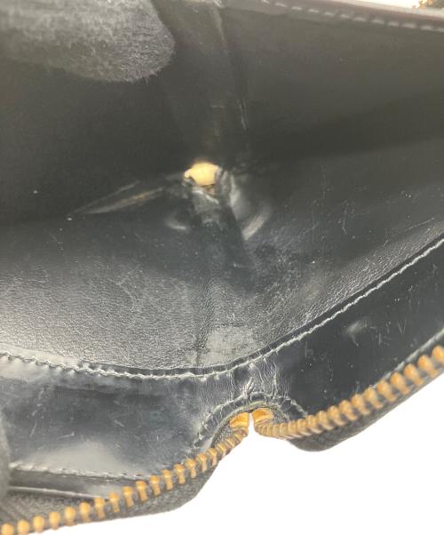 COMME des GARCONS（コムデギャルソン）COMME des GARCONS (コムデギャルソン) ラウンドファスナー財布 ブラックの古着・服飾アイテム