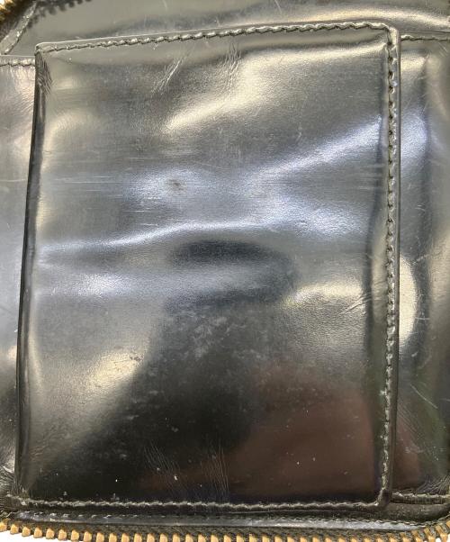 COMME des GARCONS（コムデギャルソン）COMME des GARCONS (コムデギャルソン) ラウンドファスナー財布 ブラックの古着・服飾アイテム