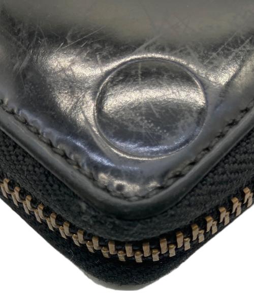 COMME des GARCONS（コムデギャルソン）COMME des GARCONS (コムデギャルソン) ラウンドファスナー財布 ブラックの古着・服飾アイテム