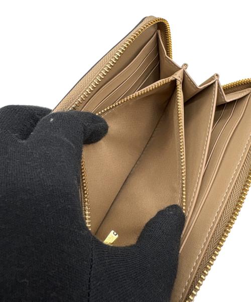 COACH（コーチ）COACH (コーチ) ラウンドファスナー財布 ホワイト×ベージュの古着・服飾アイテム