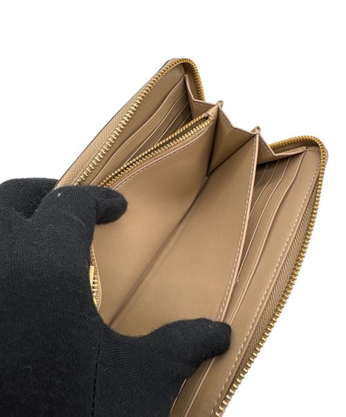 COACH（コーチ）COACH (コーチ) ラウンドファスナー財布 ホワイト×ベージュの古着・服飾アイテム