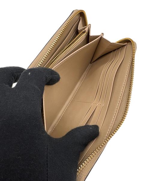 COACH（コーチ）COACH (コーチ) ラウンドファスナー財布 ホワイト×ベージュの古着・服飾アイテム