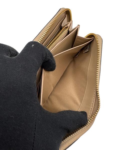 COACH（コーチ）COACH (コーチ) ラウンドファスナー財布 ホワイト×ベージュの古着・服飾アイテム