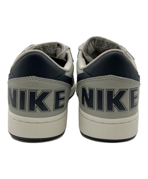 NIKE（ナイキ）NIKE (ナイキ) スニーカー グレー×ネイビー サイズ:27の古着・服飾アイテム