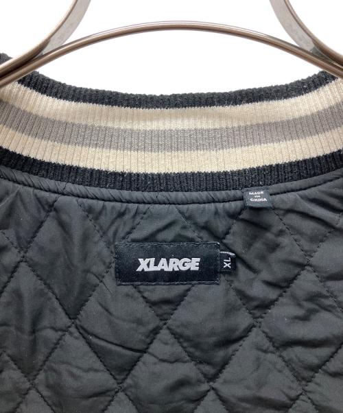 X-LARGE（エクストララージ）X-LARGE (エクストララージ) スタジャン ブラック×アイボリー サイズ:XLの古着・服飾アイテム