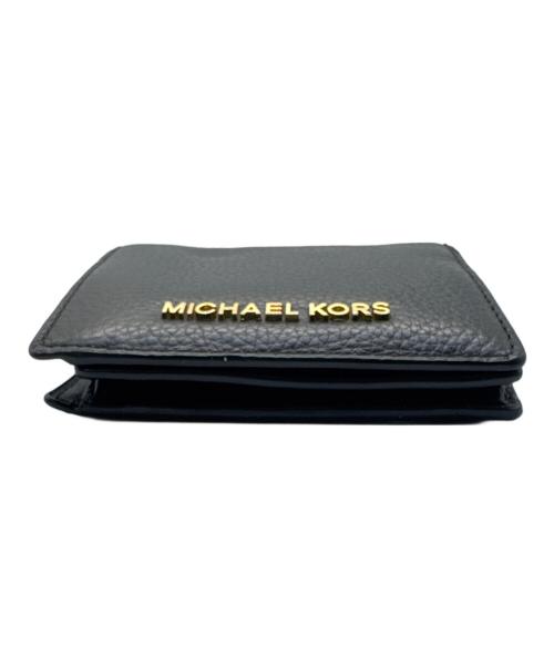 MICHAEL KORS（マイケルコース）MICHAEL KORS (マイケルコース) 2つ折り財布の古着・服飾アイテム