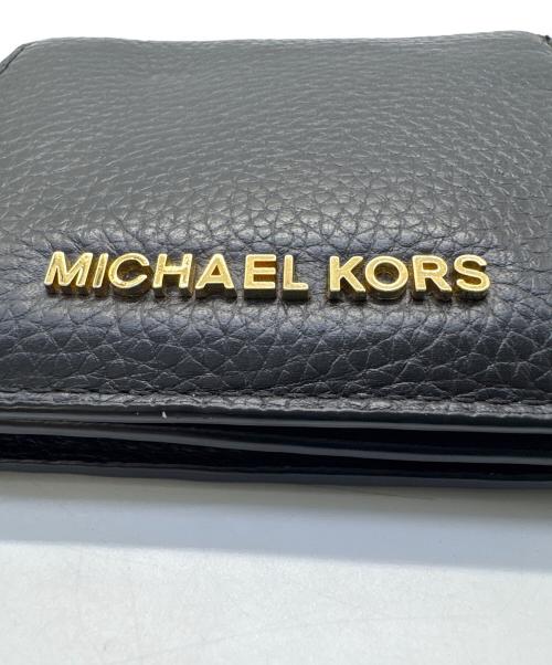 MICHAEL KORS（マイケルコース）MICHAEL KORS (マイケルコース) 2つ折り財布の古着・服飾アイテム