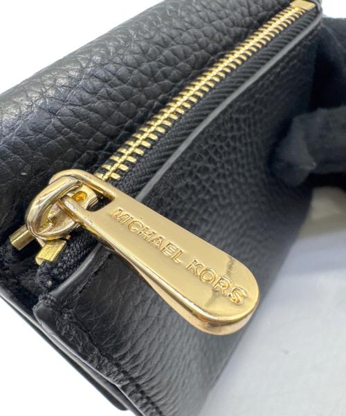 MICHAEL KORS（マイケルコース）MICHAEL KORS (マイケルコース) 2つ折り財布の古着・服飾アイテム
