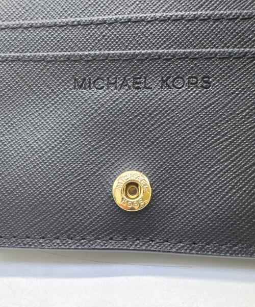 MICHAEL KORS（マイケルコース）MICHAEL KORS (マイケルコース) 2つ折り財布の古着・服飾アイテム