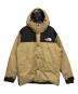 THE NORTH FACE（ザ ノース フェイス）の古着「マウンテンダウンジャケット」｜ベージュ×ブラック