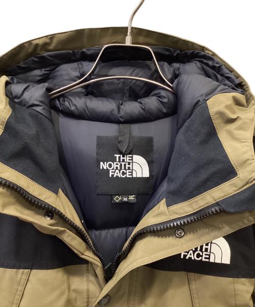 THE NORTH FACE（ザ ノース フェイス）THE NORTH FACE (ザ ノース フェイス) マウンテンダウンジャケット カーキ×ブラック サイズ:Mの古着・服飾アイテム