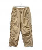 A BATHING APEア ベイシング エイプ）の古着「トラックパンツ」｜ベージュ