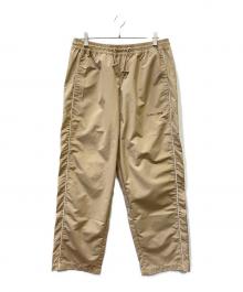 A BATHING APE（ア ベイシング エイプ）の古着「トラックパンツ」｜ベージュ