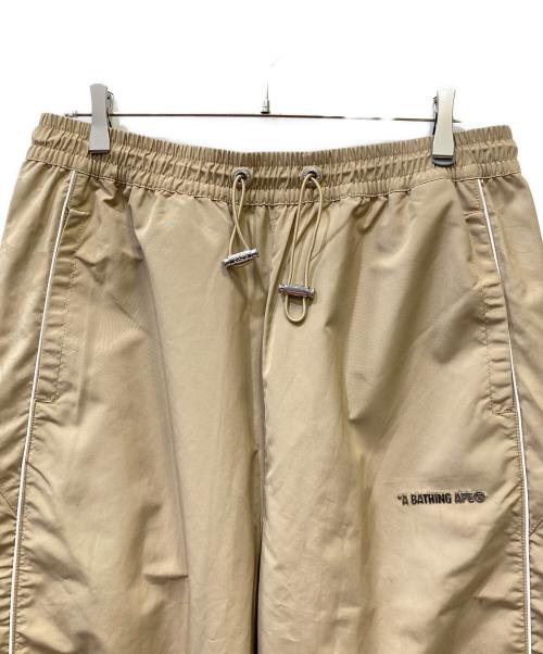 A BATHING APE（ア ベイシング エイプ）A BATHING APE (ア ベイシング エイプ) トラックパンツ ベージュ サイズ:XLの古着・服飾アイテム