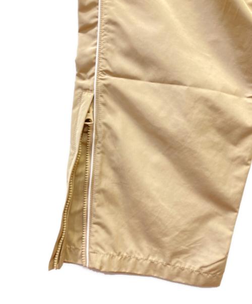 A BATHING APE（ア ベイシング エイプ）A BATHING APE (ア ベイシング エイプ) トラックパンツ ベージュ サイズ:XLの古着・服飾アイテム