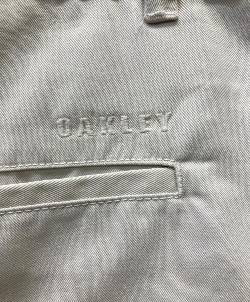 OAKLEY（オークリー）OAKLEY (オークリー) ゴルフウェア(パンツ) ベージュ サイズ:103.5㎝(W41) 未使用品の古着・服飾アイテム