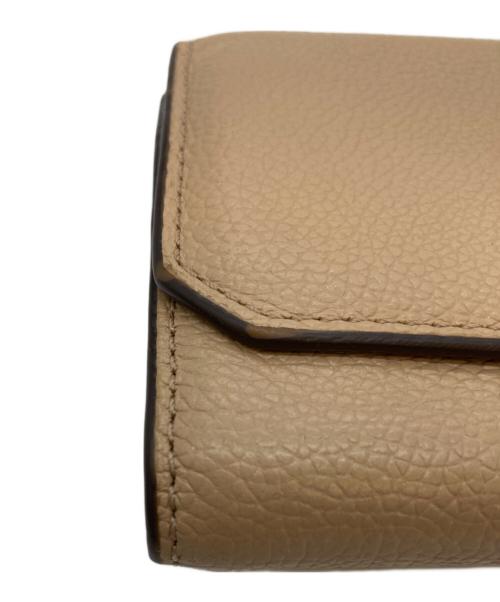 MICHAEL KORS（マイケルコース）MICHAEL KORS (マイケルコース) 3つ折り財布 ピンクの古着・服飾アイテム