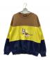 X-LARGE（エクストララージ）の古着「スウェット」｜ブラウン×イエロー