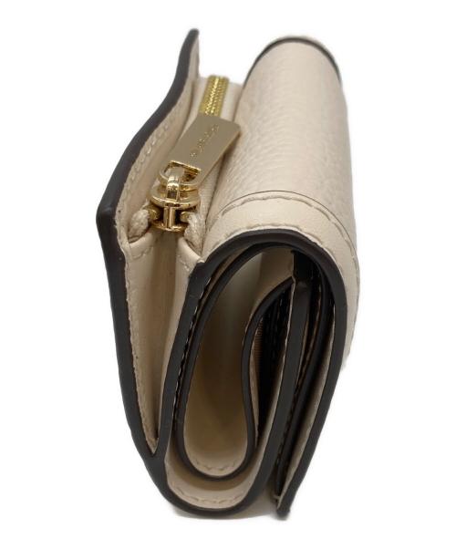 MICHAEL KORS（マイケルコース）MICHAEL KORS (マイケルコース) 3つ折り財布 アイボリーの古着・服飾アイテム