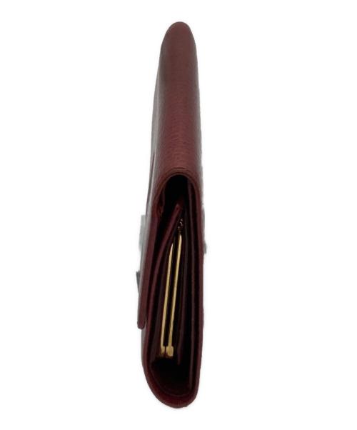 Cartier（カルティエ）Cartier (カルティエ) 3つ折り財布 ボルドーの古着・服飾アイテム