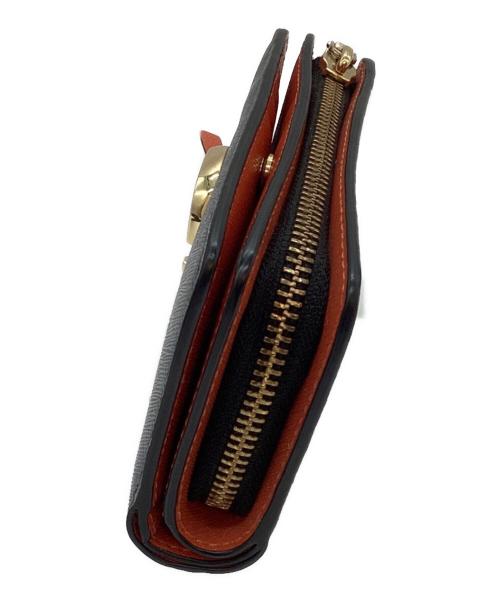 THE MARC JACOBS（ザマークジェイコブス）THE MARC JACOBS (ザマークジェイコブス) 2つ折り財布 ブラック×ホワイトの古着・服飾アイテム