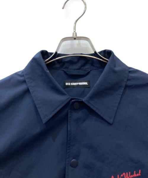 UNIQLO（ユニクロ）UNIQLO (ユニクロ) KAWS (カウズ) コーチジャケット ネイビー サイズ:Lの古着・服飾アイテム