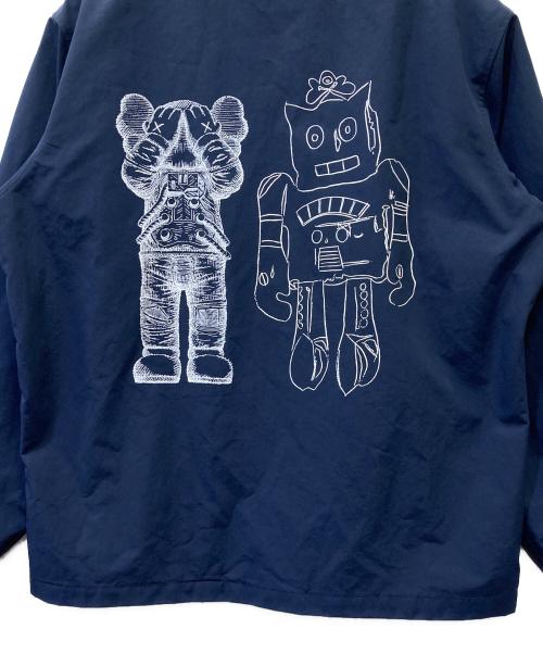 UNIQLO（ユニクロ）UNIQLO (ユニクロ) KAWS (カウズ) コーチジャケット ネイビー サイズ:Lの古着・服飾アイテム
