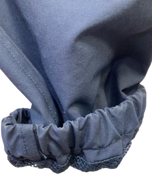 UNIQLO（ユニクロ）UNIQLO (ユニクロ) KAWS (カウズ) コーチジャケット ネイビー サイズ:Lの古着・服飾アイテム
