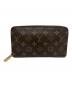 LOUIS VUITTON（ルイ ヴィトン）の古着「ラウンドファスナー財布」｜ブラウン
