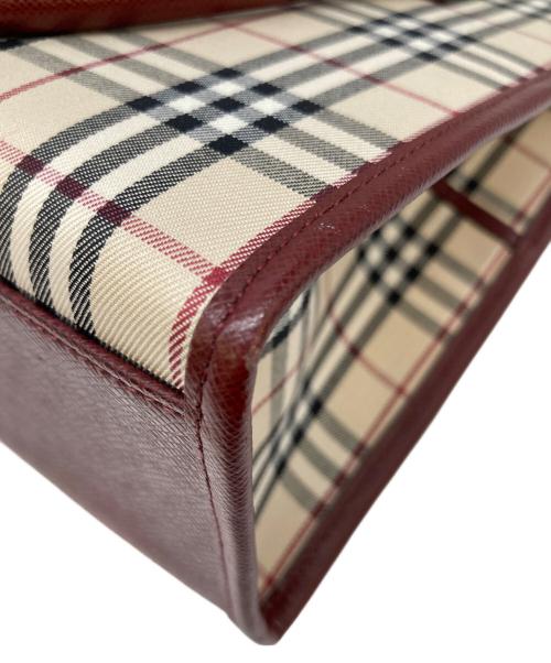 BURBERRY（バーバリー）BURBERRY (バーバリー) ハンドバッグ ブラウン×エンジの古着・服飾アイテム