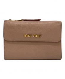 MIU MIU（ミュウミュウ）の古着「2つ折り財布」｜ピンク