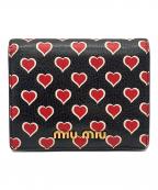 MIU MIUミュウミュウ）の古着「2つ折り財布」｜ブラック×レッド