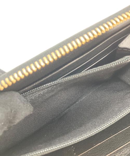 JIMMY CHOO（ジミーチュウ）JIMMY CHOO (ジミーチュウ) スターエンボスラウンドファスナー財布 ブラックの古着・服飾アイテム