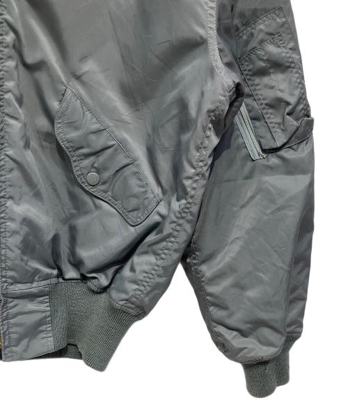 MADIN O.M.S.（マディン・オーエムエス）MADIN O.M.S. (マディン・オーエムエス) フライトジャケット グリーン×オレンジ サイズ:40の古着・服飾アイテム