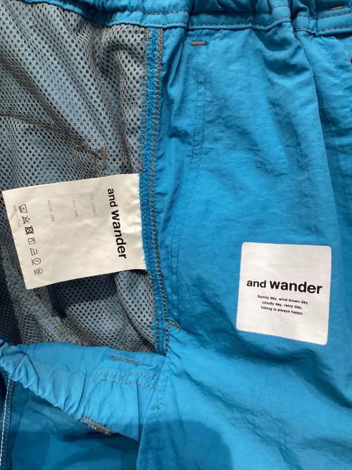 and wander（アンドワンダー）and wander (アンドワンダー) ナイロンパンツ スカイブルー サイズ:Lの古着・服飾アイテム