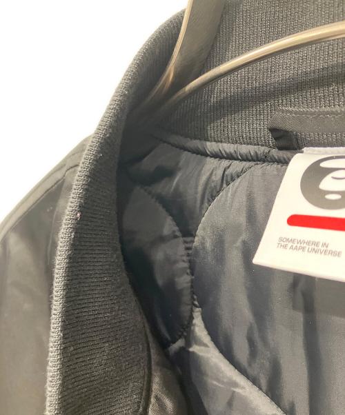 Aape BY A BATHING APE（エーエイプ バイ アベイシングエイプ）Aape BY A BATHING APE (エーエイプ バイ アベイシングエイプ) ベースボールジャケット AAPE NOW moonface logo baseball jacket ブラック サイズ:Mの古着・服飾アイテム